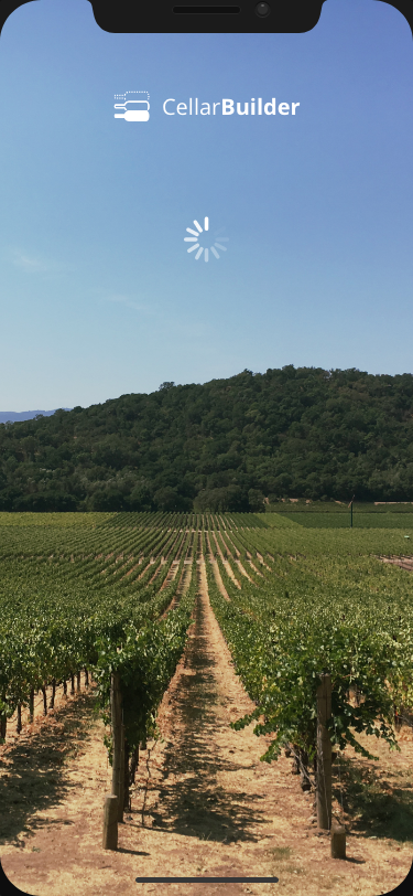 CellarBuilder splash screen with logo over vineyard photo and loading indicator