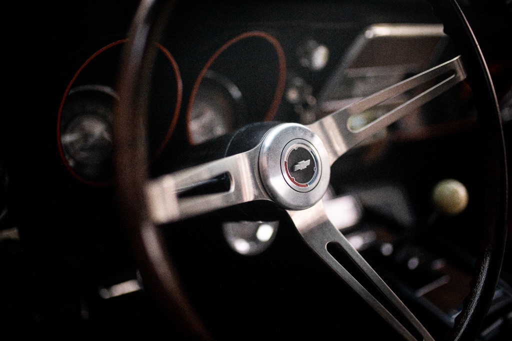 Vintage Camaro steering wheel with Chevrolet bowtie horn button